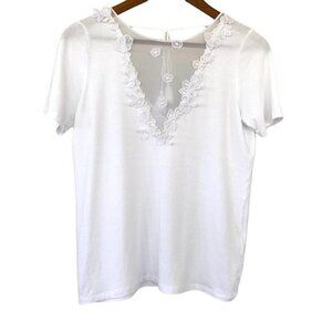 Elie Tahari jersey knit top with floral appliqués, tie at the back